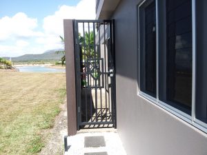 Black Painted Gate—Lattice and Patios in Bungalow QLD
